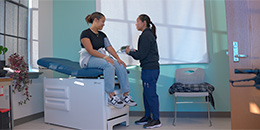 A faculty member takes a patients blood pressure