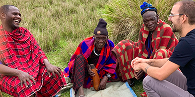 Eli Snyder talks with members of an African tribe