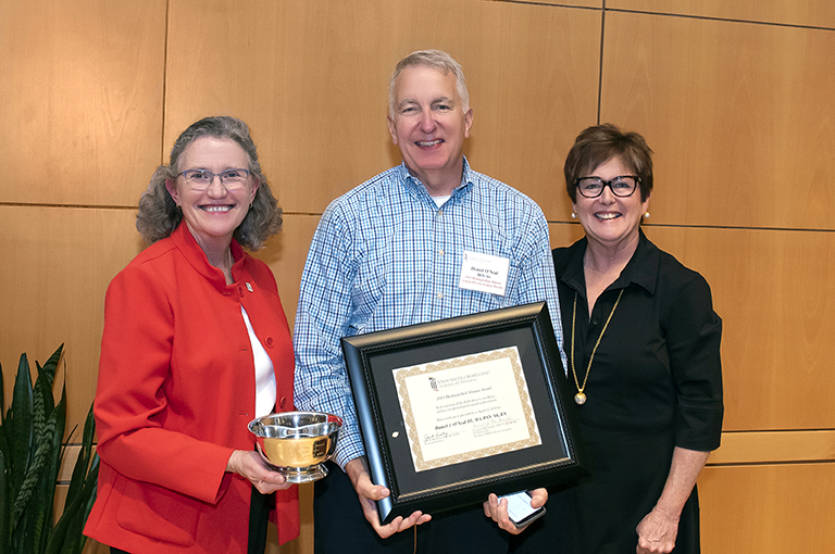 Dean Kirschling, Dan O’Neal III, BSN ’66, and Carmel McComiskey at the UMSON reunion.