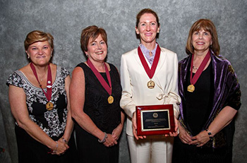 Velez with her award at the induction ceremony.