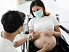 Nurse with a pregnant woman